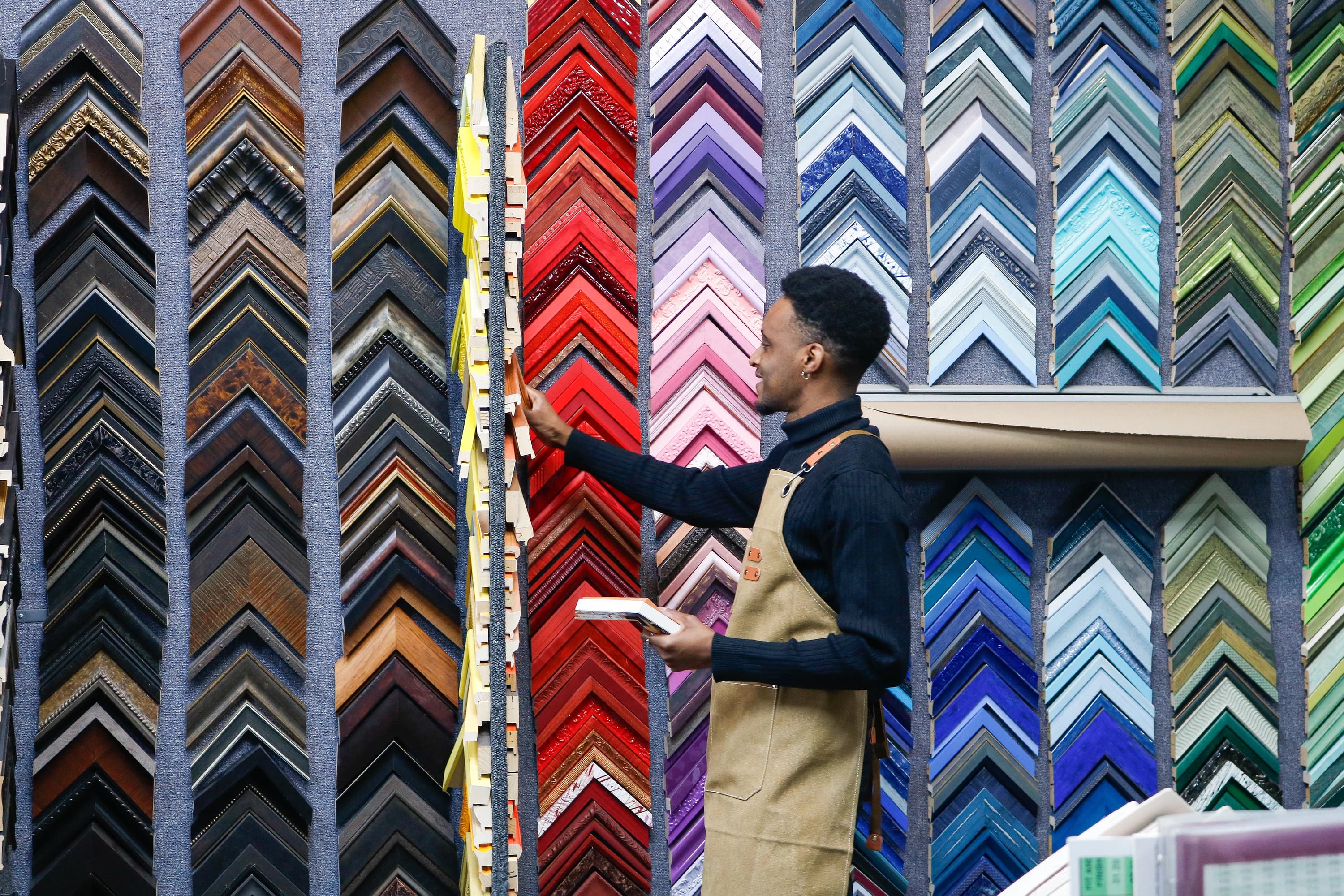 Picking molding from the wall of frame samples
